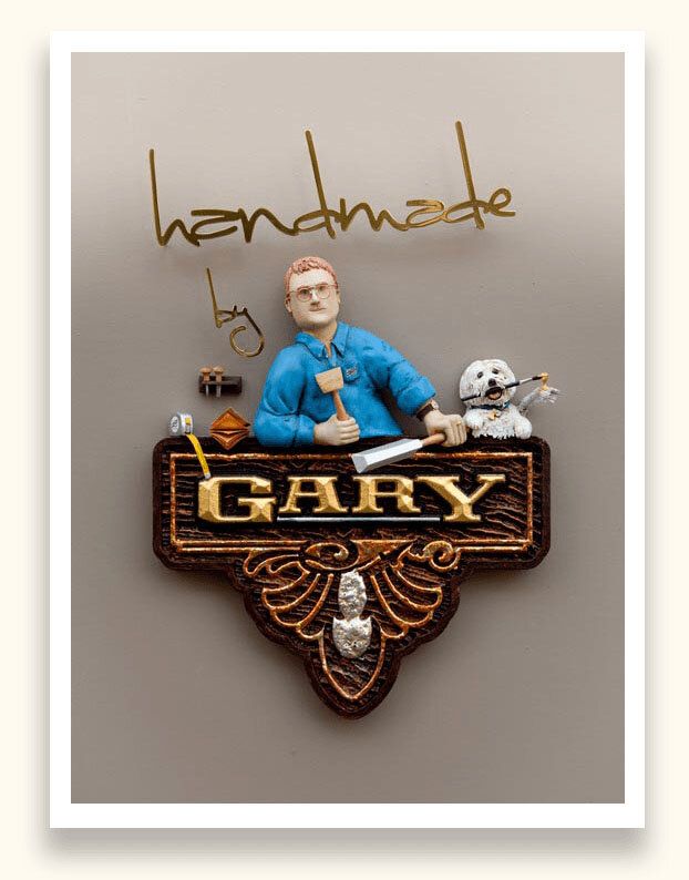 Award-winning sculpted sign of sign maker Gary Johnson and his dog beneath gold leaf handmade-by script