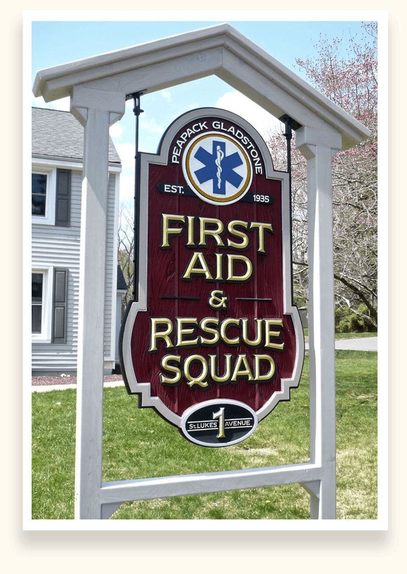 Maroon sandblasted HDU sign with gold lettering for the Peapack-Gladstone First Aid and Rescue Squad
